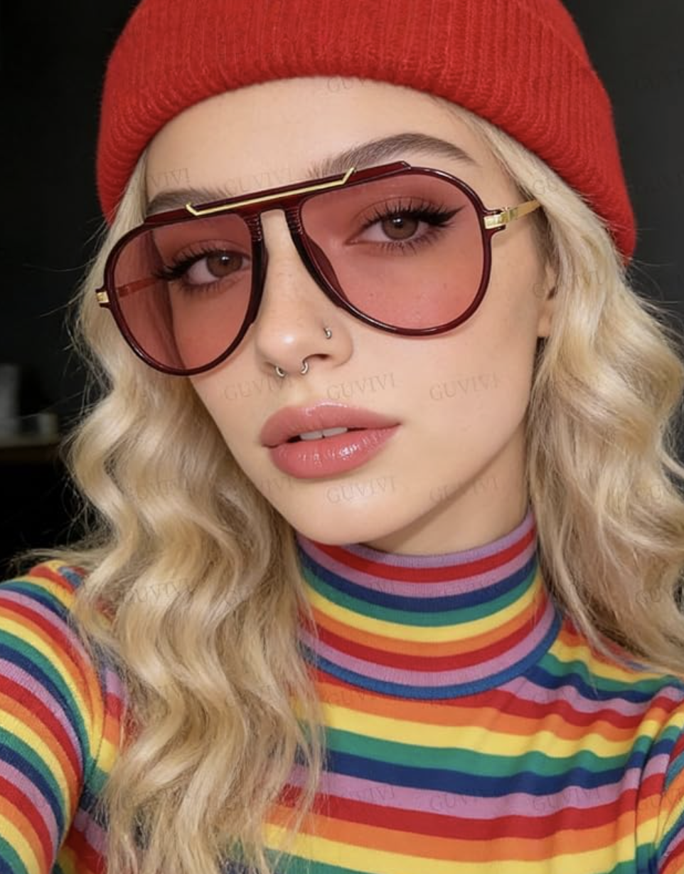 Woman wearing oversized aviator sunglasses with tinted lenses, part of Kara Brownlee's Summer Sunnies Edit